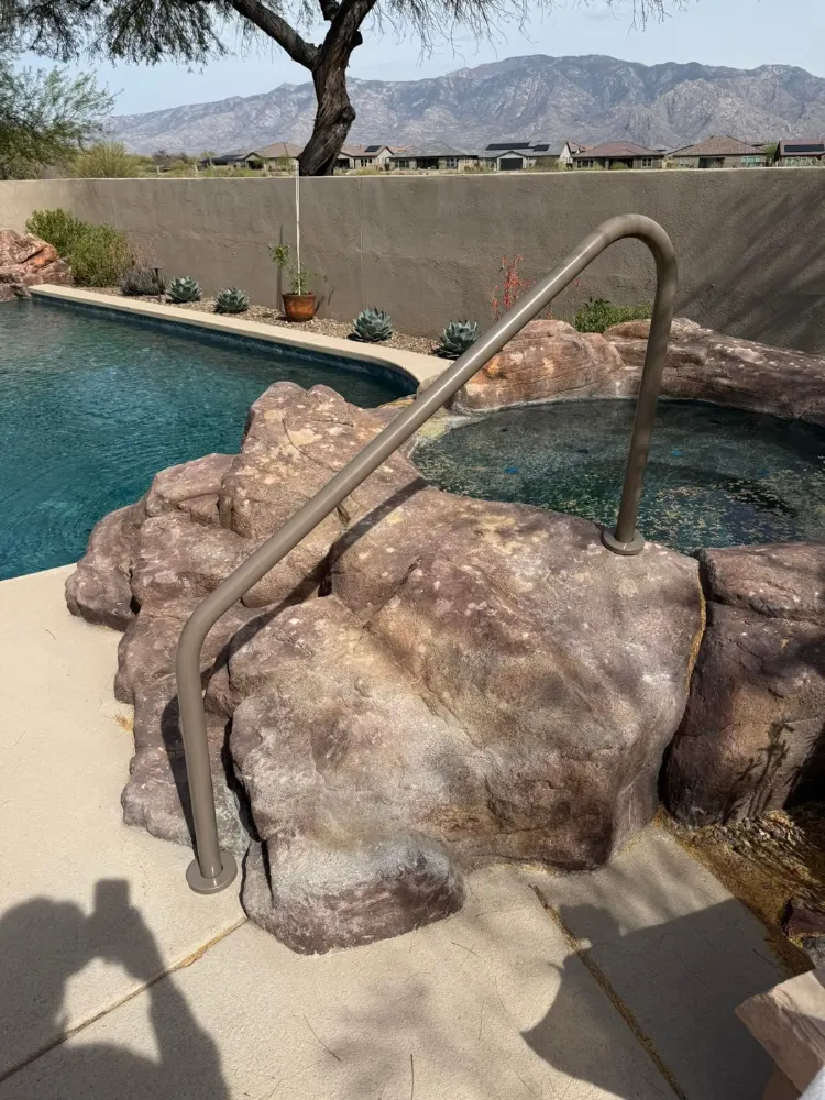 Clear inground pool and rock spa on weekly service in Tucson